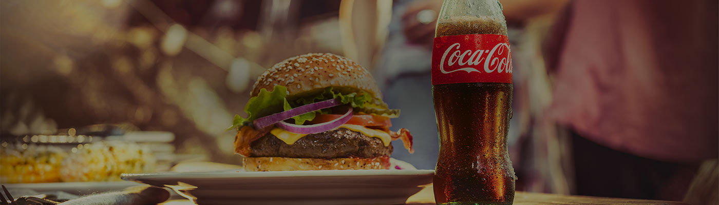 a classic coke with a burger